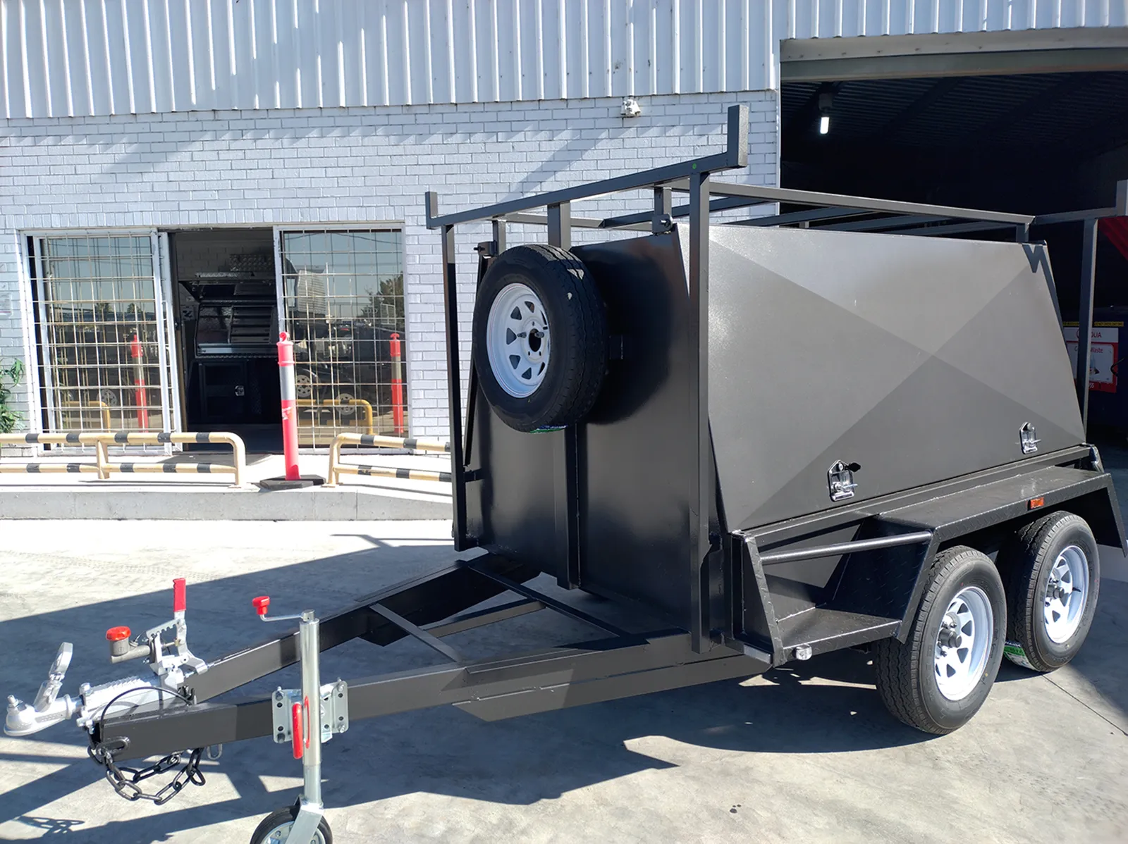 8x5 one piece tadesmand trailer for sale NSW with rear lift up door