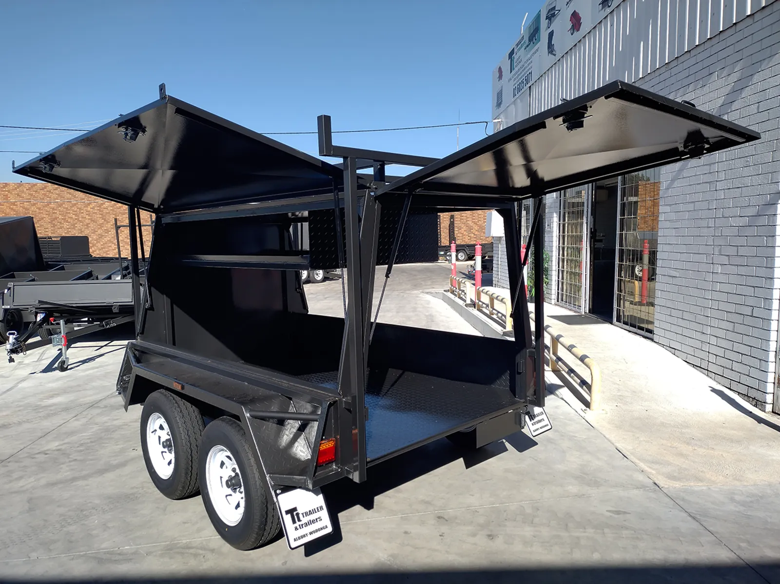 8x5 one piece tradesman trailer for sale NSW with rear lift up door 13
